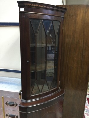 Lot 443 - A REPRODUCTION MAHOGANY CORNER CUPBOARD