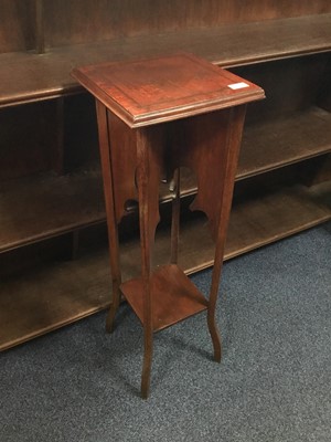 Lot 452 - AN OAK PLANT STAND AND A SOFA TABLE