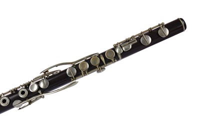 Lot 1137 - AN EARLY 20TH CENTURY ROSEWOOD FLUTE BY LAFLEUR