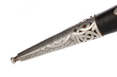 Lot 1380 - A LATE VICTORIAN SILVER MOUNTED SCOTTISH DIRK