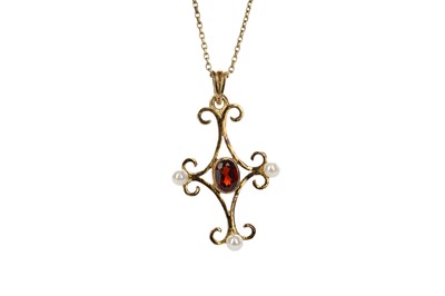 Lot 807 - A GARNET AND FAUX PEARL PENDANT