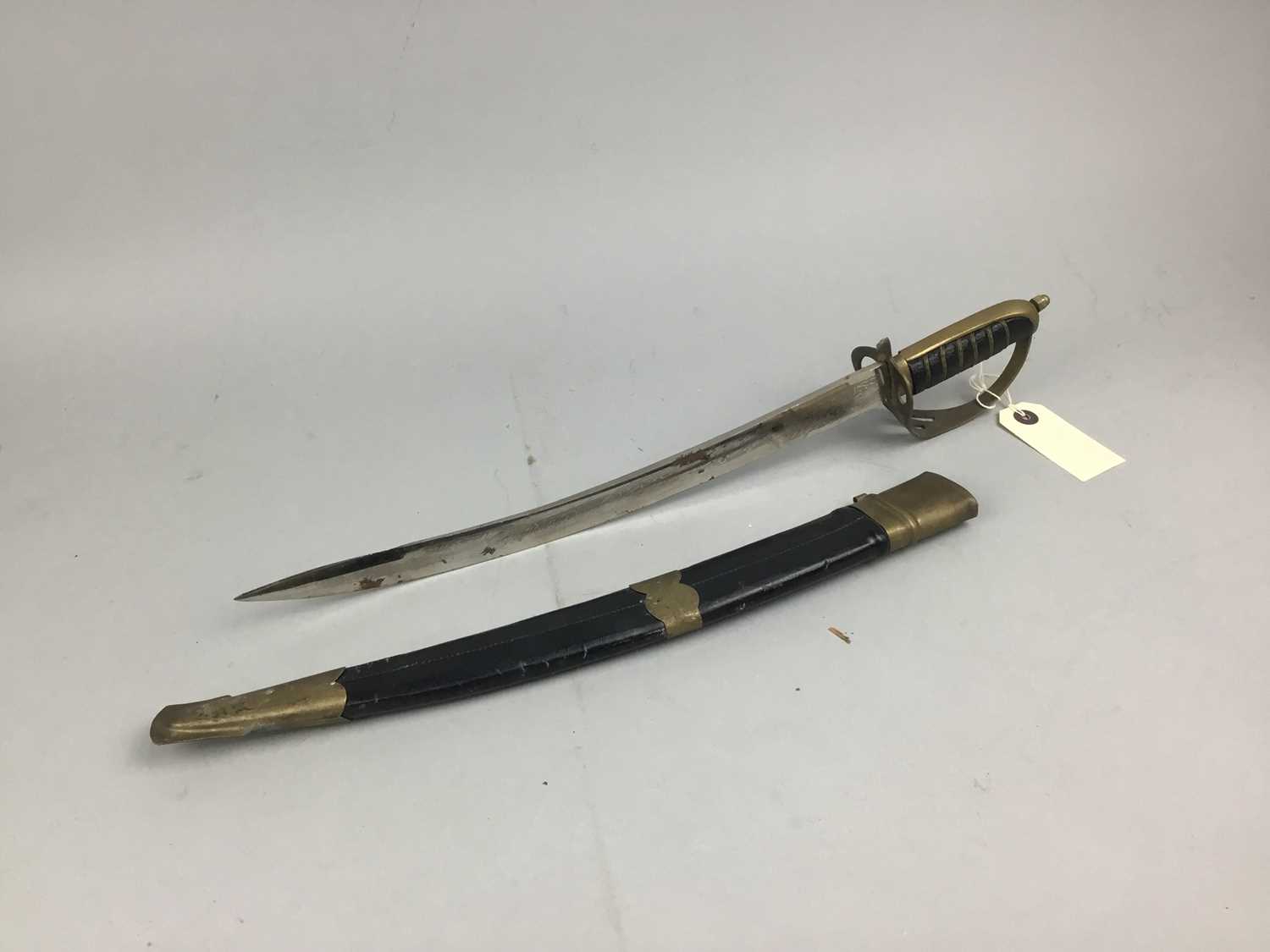 Lot 73 - A LATE 19TH CENTURY SHORT SWORD WITH BRASS MARKED SCABBARD