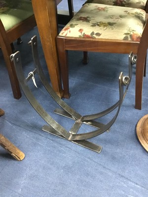 Lot 225 - A WROUGHT IRON LOG STAND