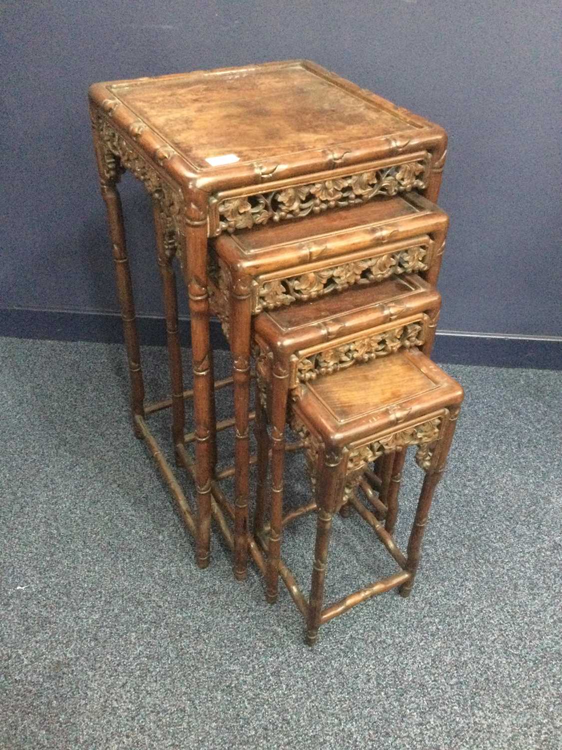 Lot 722 - A CHINESE NEST OF FOUR TABLES