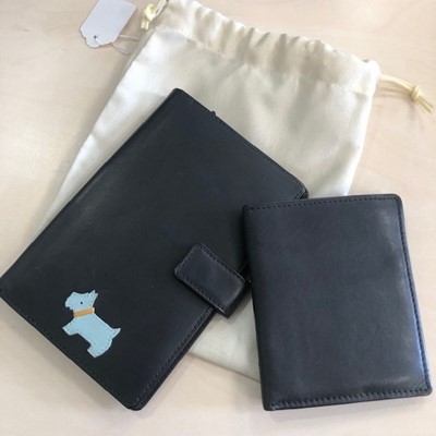 Lot 318 - A RADLEY LEATHER WALLET AND PURSE