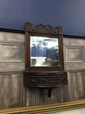Lot 208 - A LATE VICTORIAN CARVED WOOD HALL MIRROR