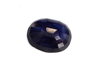 Lot 1553 - A CERTIFICATED UNMOUNTED GLASS FILLED SAPPHIRE