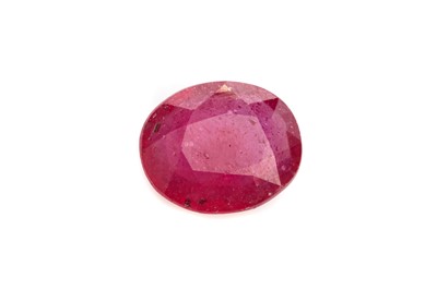 Lot 877 - A CERTIFICATED UNMOUNTED GLASS FILLED RUBY