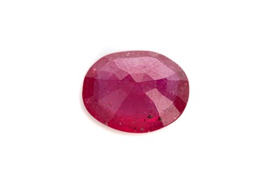 Lot 877 - A CERTIFICATED UNMOUNTED GLASS FILLED RUBY