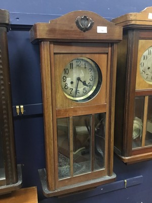 Lot 246 - AN EARLY 20TH CENTURY STAINED WOOD KITCHEN WALL CLOCK