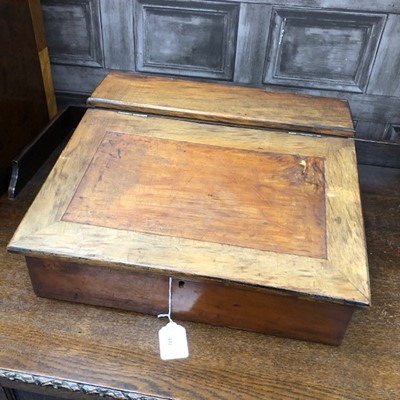 Lot 431 - AN EARLY 20TH CENTURY OAK WRITING SLOPE, ALONG WITH A DOOR STOP