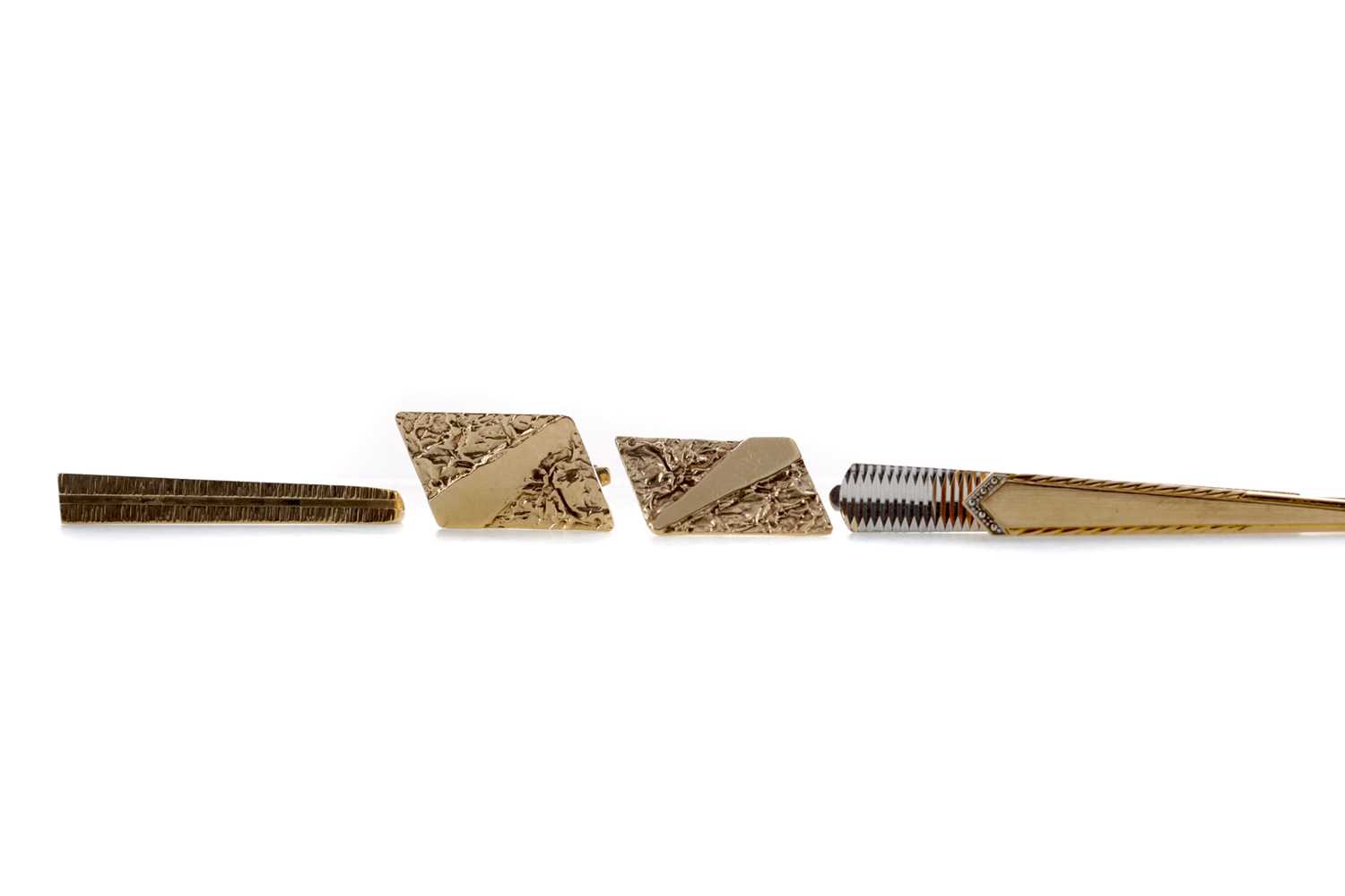 Lot 876 - THREE TIE SLIDES AND A PAIR OF GOLD CUFFLINKS