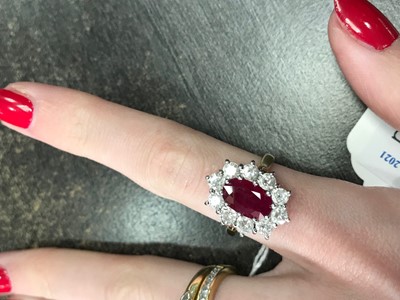 Lot 836 - A RUBY AND DIAMOND CLUSTER RING