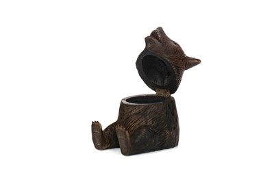 Lot 1348 - A BLACK FOREST CARVED WOOD INKWELL