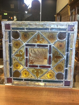 Lot 1350 - A SET OF LATE 19TH CENTURY STAINED AND LEADED GLASS PANELS