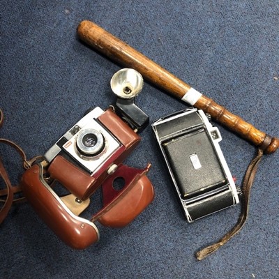 Lot 479 - A VINTAGE POLICE TRUNCHEON AND TWO CAMERAS