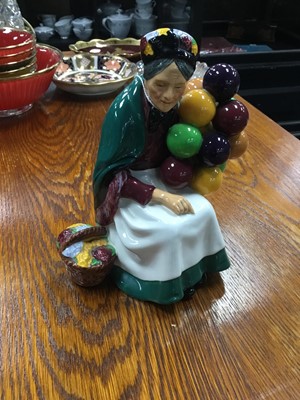 Lot 558 - A ROYAL DOULTON FIGURE OF THE OLD BALLOON SELLER ALONG WITH A CLARICE CLIFF PRESERVE JAR