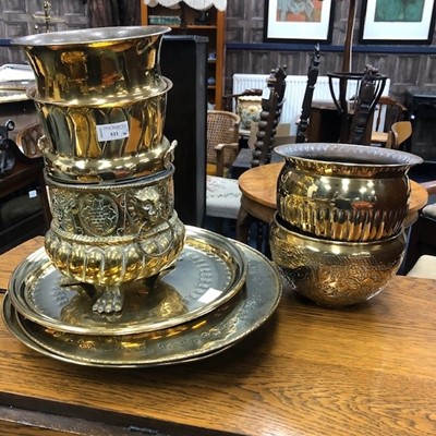 Lot 511 - A LOT OF FIVE BRASS JARDINERES AND THREE BRASS PLAQUES