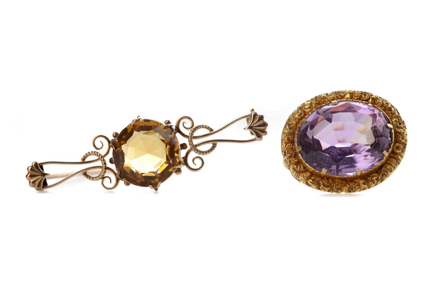 Lot 908 - AN AMETHYST AND A CITRINE BROOCH