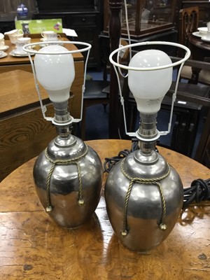 Lot 506 - A PAIR OF HAMMERED METAL TABLE LAMPS