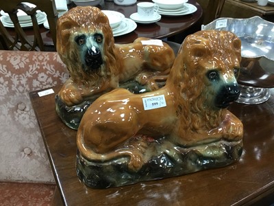 Lot 599 - A PAIR OF BO'NESS RECUMBANT LIONS