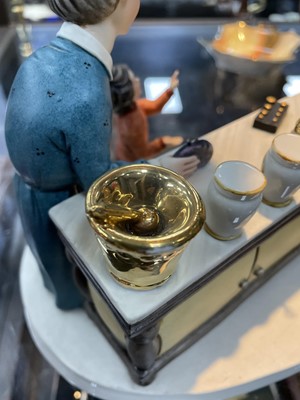 Lot 152 - A CAPODIMONTE GROUP OF THE PHARMACIST AND AN ADDERLAY FIGURE