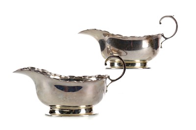 Lot 531 - A PAIR OF EARLY 20TH CENTURY SILVER SAUCE BOATS