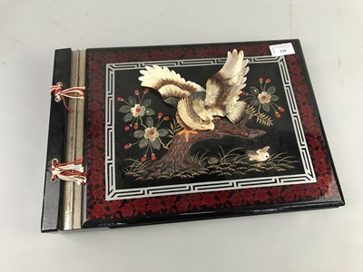 Lot 129 - A BLACK LACQUERED MUSICAL PHOTOGRAPH ALBUM AND TWO OTHERS