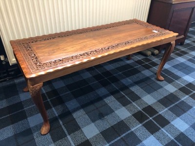 Lot 234 - AN EASTERN CARVED COFFEE TABLE