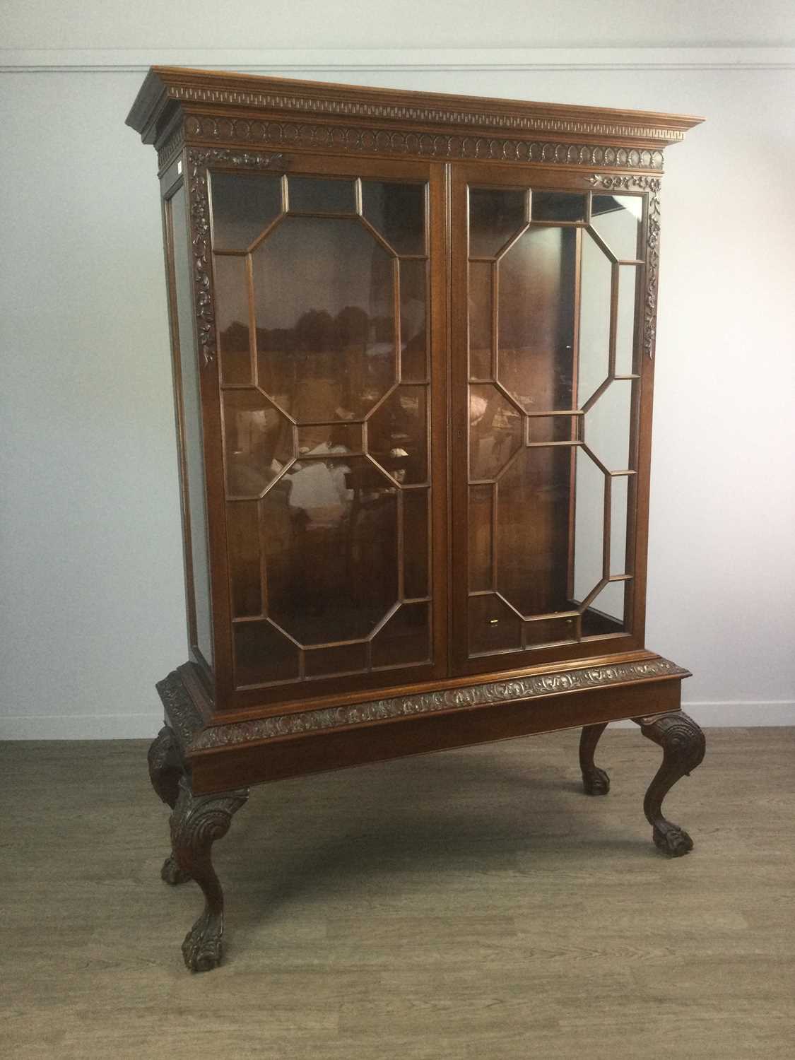 Lot 1416 - A MAHOGANY DISPLAY CABINET OF CHIPPENDALE DESIGN
