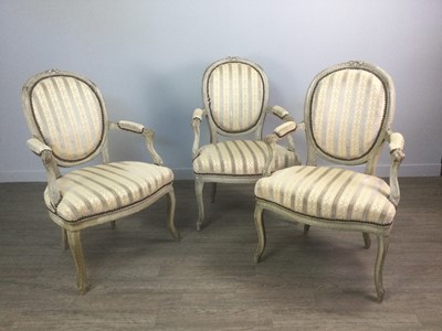 Lot 680 - A LOT OF THREE FRENCH GREY PAINTED OPEN ELBOW CHAIRS OF LOUIS XV DESIGN