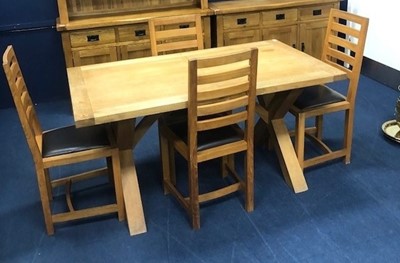 Lot 267 - A MODERN OAK DINING TABLE AND SIX CHAIRS