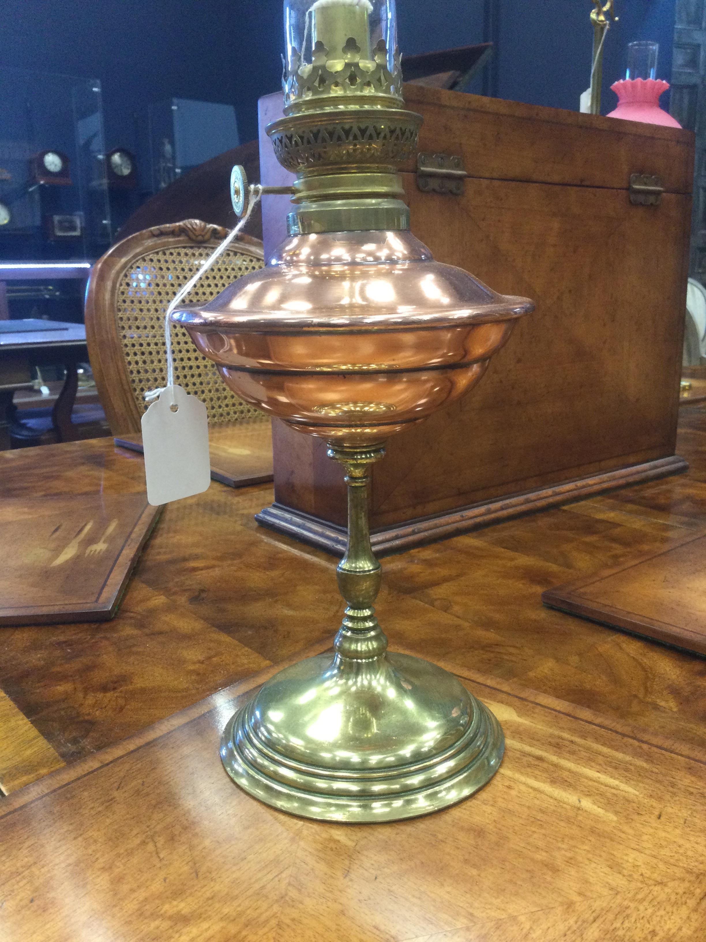 Lot 1365 - A LOT OF TWO OIL LAMPS IN THE MANNER OF W.A.