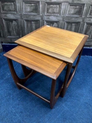 Lot 323 - A NEST OF THREE RETRO TEAK TABLES