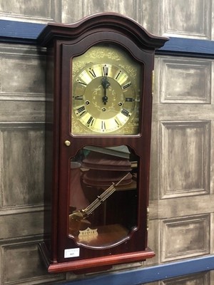 Lot 405 - A REPRODUCTION WALL CLOCK