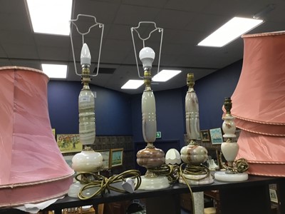 Lot 394 - A LOT OF FOUR VARIOUS ONYX TABLE LAMPS