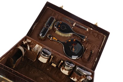 Lot 1436 - A CASED SILVER AND TORTOISESHELL DRESSING TABLE SET