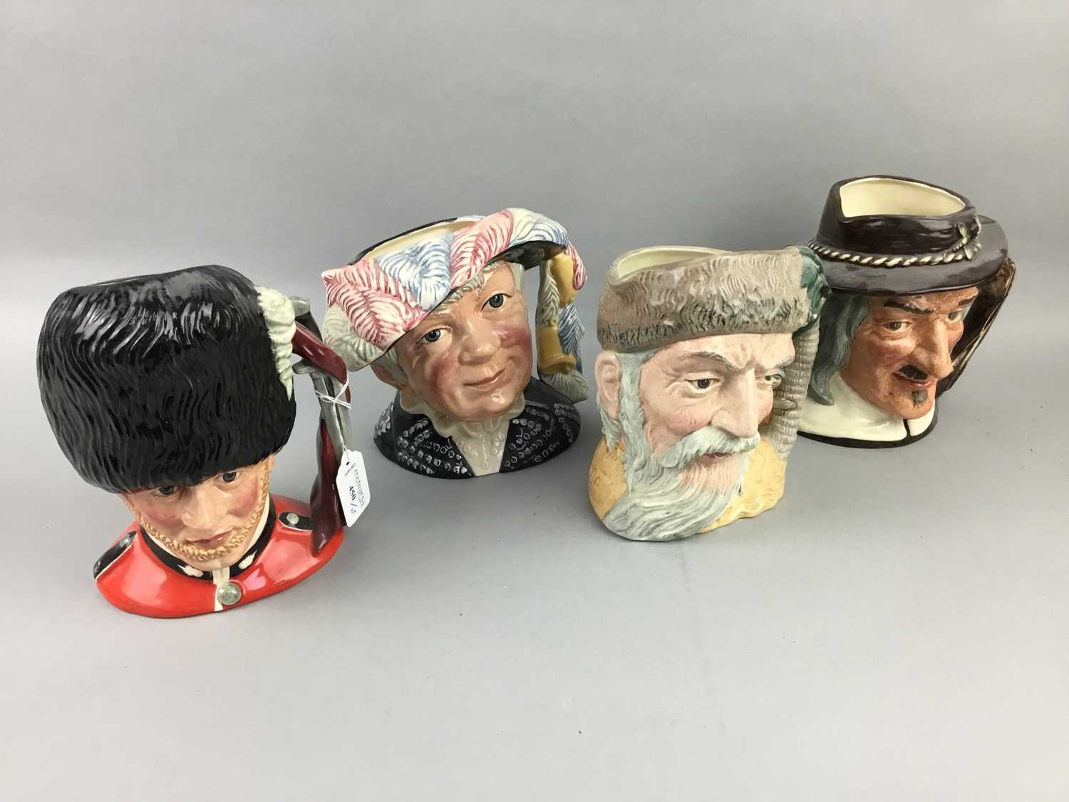 Lot 450 - A LOT OF ROYAL DOULTON CHARACTER JUGS AND A CHARACTER JUG BOOK