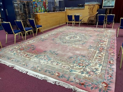 Lot 1443 - A LARGE CHINESE WOOL BORDERED CARPET