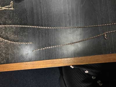 Lot 313 - A GOLD GUARD CHAIN AND A BRACELET