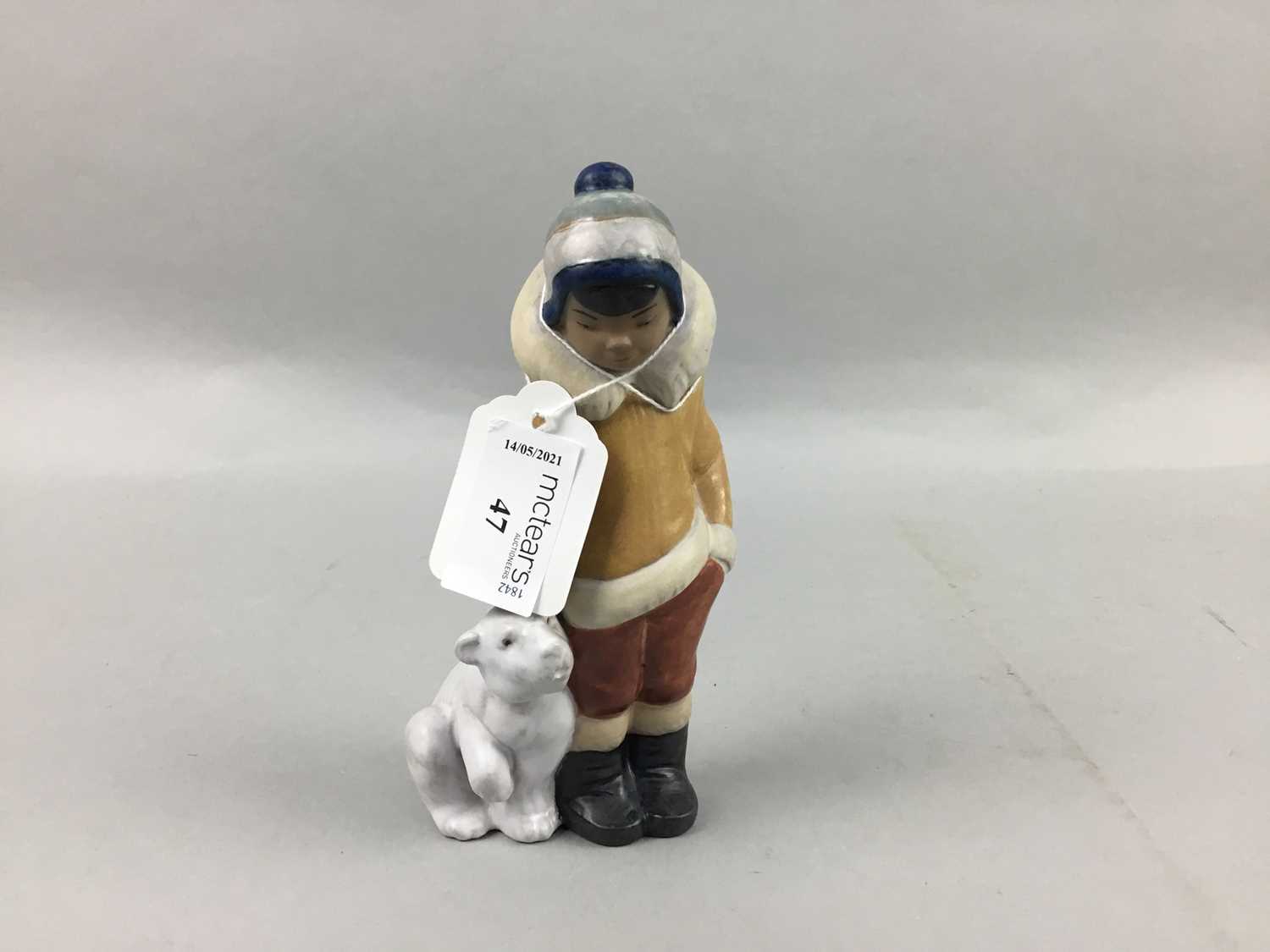 Lot 47 - A LLADRO FIGURE GROUP OF A CHILD AND A POLAR BEAR CUB