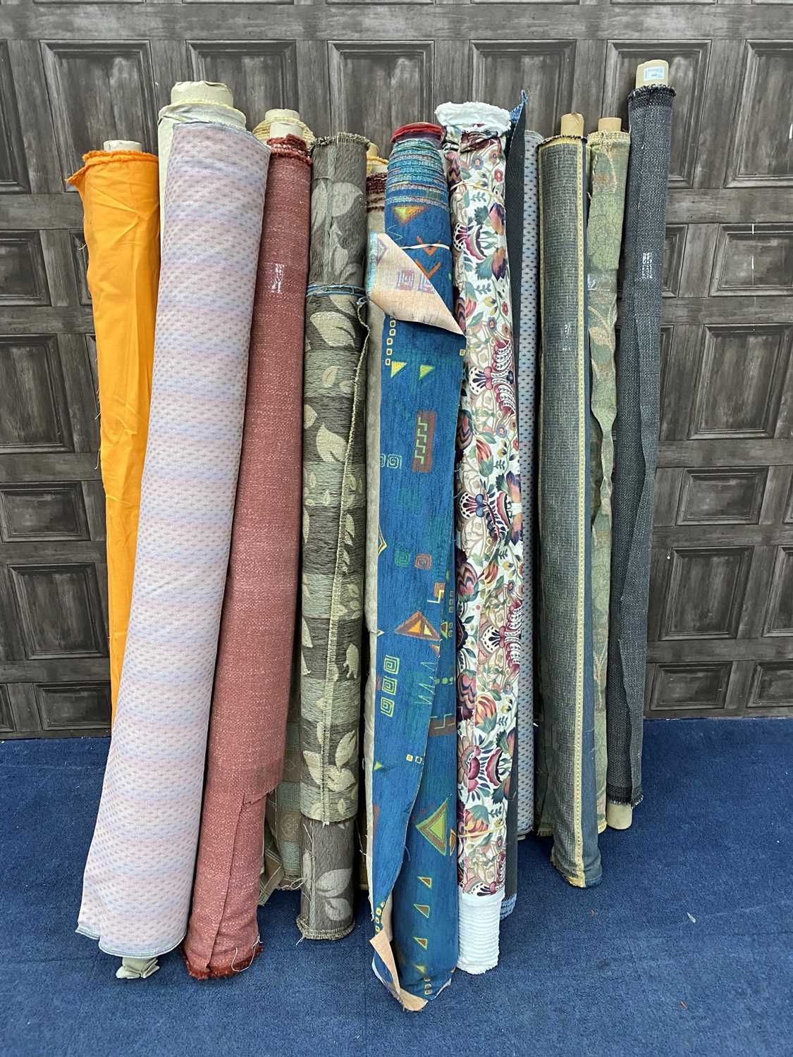 Lot 460 - A LARGE LOT OF FABRIC ROLLS