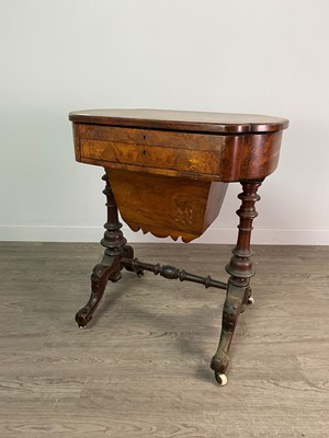 Lot 485 - A VICTORIAN WALNUT SEWING TABLE