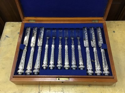 Lot 519 - A CANTEEN OF SILVER PLATED CUTLERY, ANOTHER CANTEEN, A BOOKSTAND AND A BELL