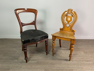 Lot 493 - A SET OF THREE VICTORIAN DINING CHAIRS AND AN OAK HALL CHAIR