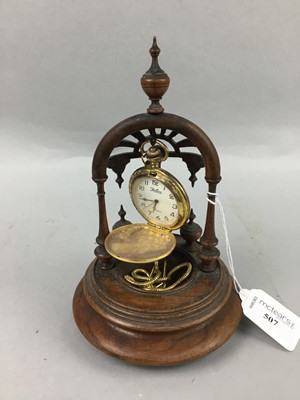 Lot 507 - A VICTORIAN TREEN POCKET WATCH STAND AND A GILDED METAL POCKET WATCH