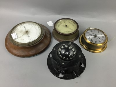 Lot 508 - A METAL CASED CIRCULAR BAROMETER,A COMPASS, WALL CLOCK AND ANOTHER BAROMETER