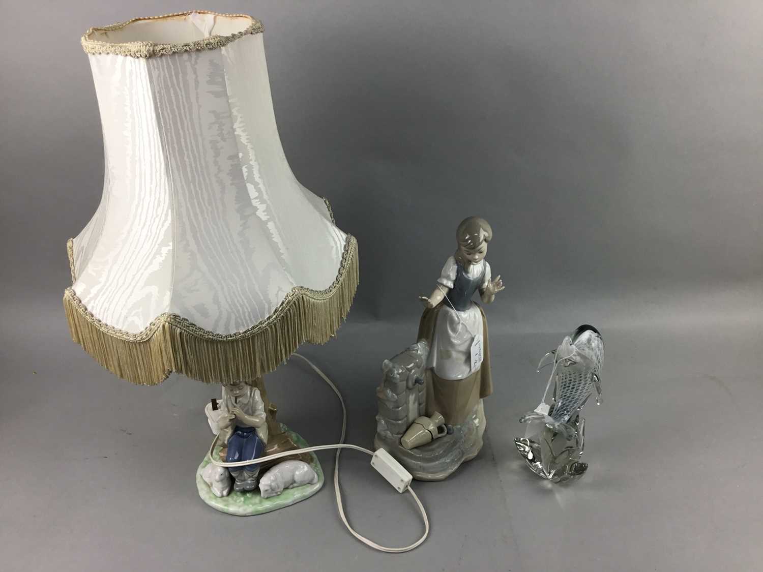 Lot 1 - A NAO FIGURE OF A GIRL, NAO LAMP, GLASS DOLPHIN AND PART CANTEEN