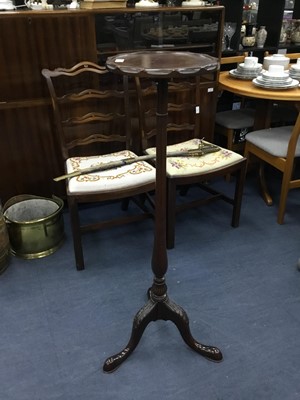 Lot 532 - A MAHOGANY TORCHERE