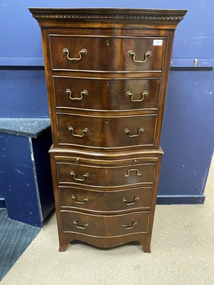 Lot 525 - A REPRODUCTION MAHOGANY SERPENTINE FRONTED CHEST ON CHEST